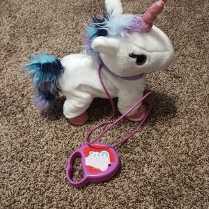 Unicorn it moves and makes noise when you press the control that is attached to
